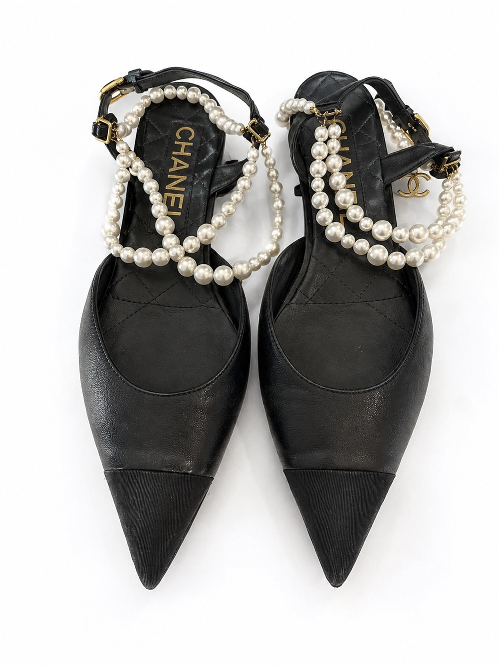 CHANEL Black Pointed-Toe Pearl Strap Pumps